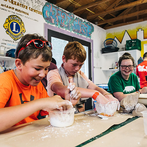 Image of Camp Huronda campers doing arts and crafts